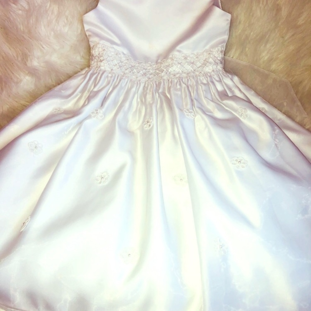 Child’s white formal dress.
